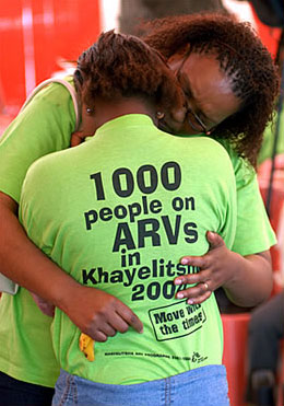 A rape victim being comforted at a ceremony in Khayelitsha, South Africa