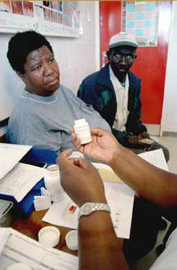 A couple receives ARV medications in Cape Town, South Africa