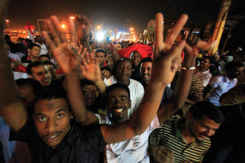 Sudanese and Egyptian residents in Khartoum, Sudan, celebrated the downfall of the Mubarak government