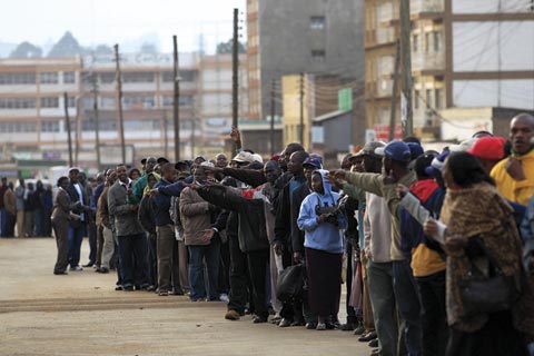 Voters queue up for a referendum on a new constitution in Kenya in 2010