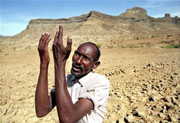 Ethiopian farmer Teshoma Abera laments the absence of rainfall