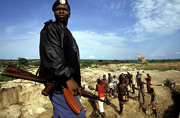 Guard at an illegal diamond mine in Angola during the country’s civil war