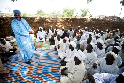 Ibrahim Gambari, head of Darfur peacekeeping mission, meets with traditional leaders at a camp for internally displaced people in West Darfur