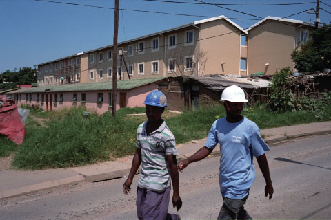 Construction of a housing project in KwaMashu, the largest poor township near South Africa's port city of Durban