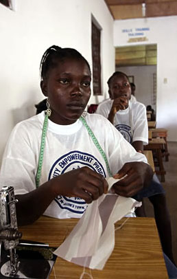 A Liberian ex-combatant at a sewing class, to improve her skills in a tight job market