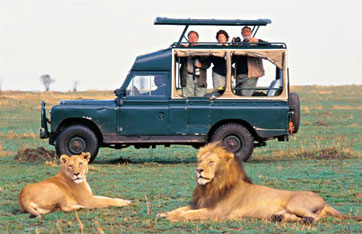 Tourists view wildlife at a Kenyan reserve