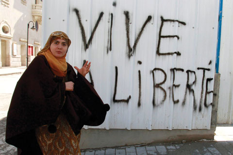 “Long live freedom!” declares graffiti in Tunis