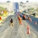 Roadworkers undertaking repairs on a World Bank funded road. Photo credit: World Bank/Trevor Samson