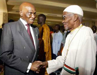 President Abdoulaye Wade (left) with Father Augustin Diamacoune Senghor, political leader of the Casamance rebels
