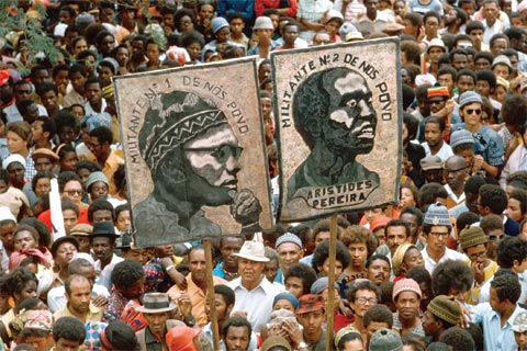 A rally in Cape Verde with portraits of Amilcar Cabral and Aristides Pereira