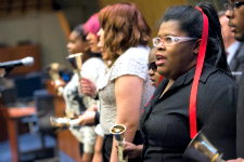 Image of woman ringing bell at UN Headquarters