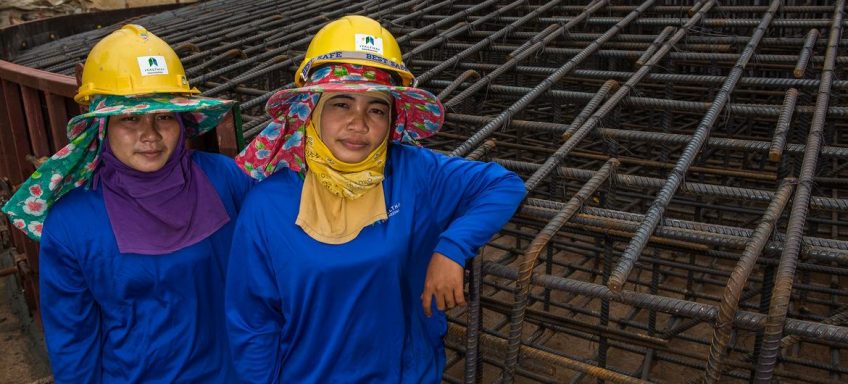 © ADB Female construction workers help to build the foundation for a wind farm in Thailand.