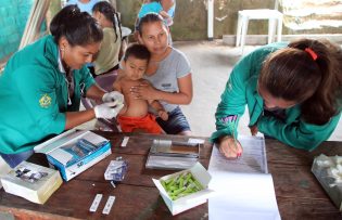 Indigenous woman and child at clinic