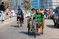 Photographer, Andy Isaacson, Bangladesh. Access Bangladesh Foundation in Dhaka supports an association of disabled former beggars turned street hawkers working at rail stations, bus terminals, and along sidewalks.