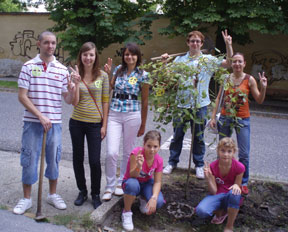 students with tree they have planted