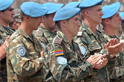 Armenian Peacekeepers with their logo on arm standing in rows. 