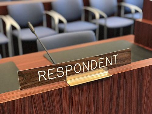 Photo of Respondent's sign in UN Dispute Tribunal courtroom in New York.
