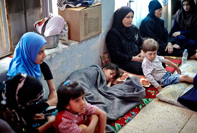 Los grupos minoritarios en Iraq están sufriendo persecución por motivos de su religión y origen étnico, advirtieron expertos en derechos de la ONU, ahora que el país está una vez más sumido en el conflicto. En la foto, las familias que huyeron de los combates en Mosul. ACNUR/S. Baldwin