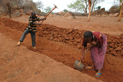 Terracing lands helps to reduce soil erosion and run-off, thereby improving farmers' chances of higher yields. Photo: FAO/Thomas Hug