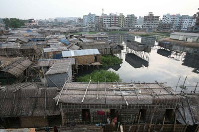 Gender equality and sustainable urbanization: Slum and highrise contrast © Manoocher Deghati/ IRIN News