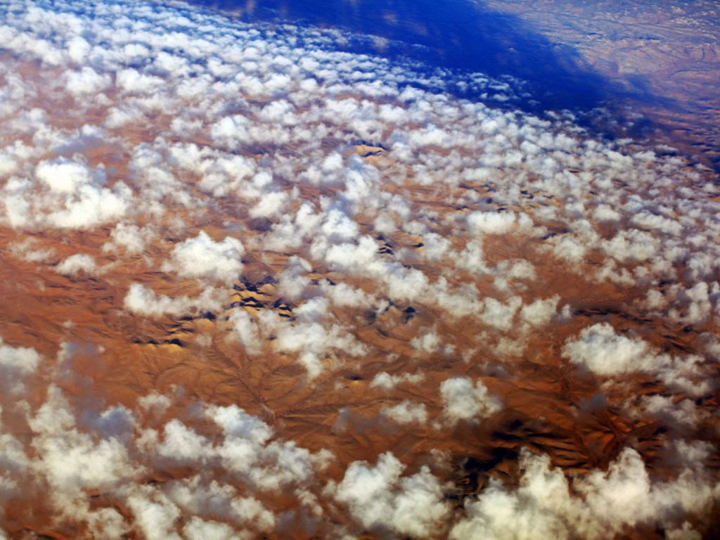 Clouds over the desert in southern Libya. Deserts form a large part of the country and human settlements are mostly found around oases. Photo Credits: Lason Athanasiadis/UNSMIL