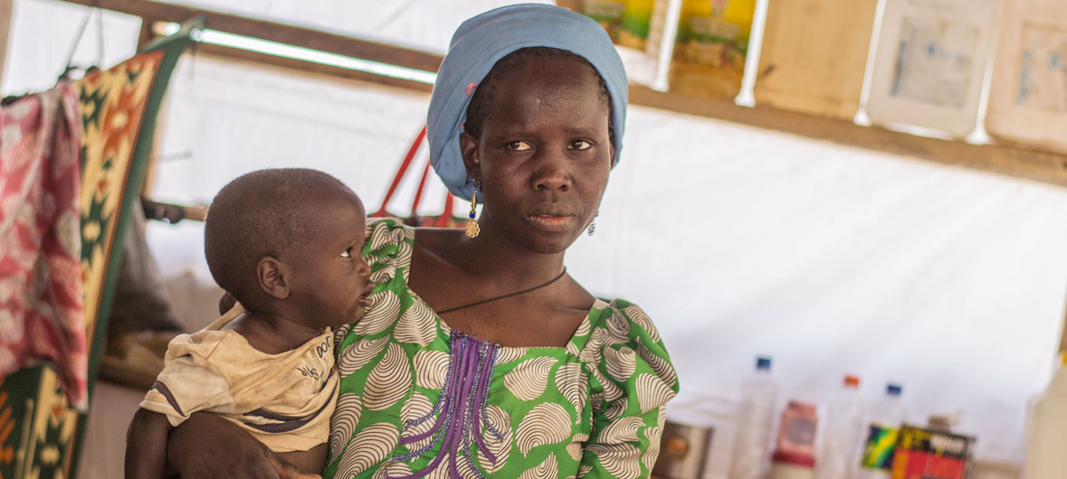 A mother and her baby at Internally Displaced People (IDP) Camp B in Mafa, Borno State, Nigeria.