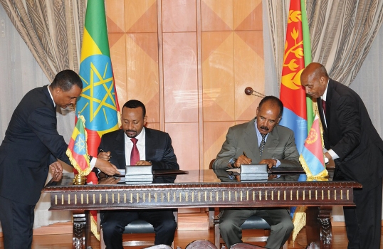 President Isaias Afwerki and Prime Minister Abiy Ahmed sign the Joint Declaration of Peace and Friendship between Eritrea and Ethiopia on 9 July 2018. Photo: Yemane Gebremeskel