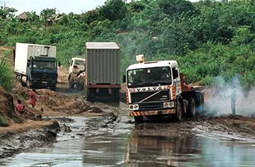 Trucks on road in West Africa