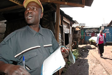 A worker for a Kenyan savings group in the Kibera slums of Nairobi