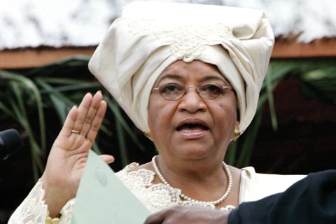 Ellen Johnson-Sirleaf taking the presidential oath in Liberia