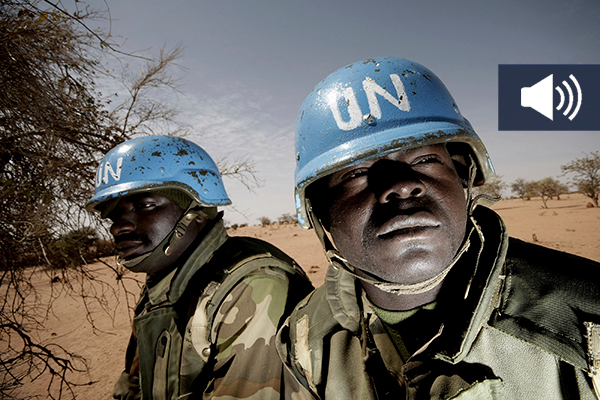 Members of the Nigerian battalion of the United Nations-African Union Hybrid Mission in Darfur (UNAMID) on patrol during a community meeting between UNAMID officials and Arab nomads.