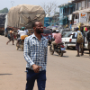 People and trucks cross at the Ghana-Côte d'Ivoire border at Elubo.