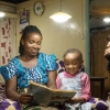 Solar home systems benefits a family in rural communities of Rwanda.