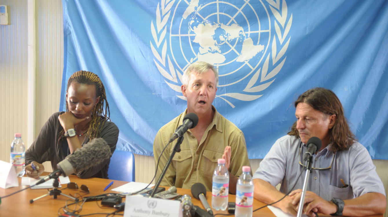 Head of the UN Mission for Ebola Emergency Response (UNMEER) Anthony Banbury (centre) speaks to reporters in Monrovia, Liberia. Photo: UNMIL/Emmanuel Tobey