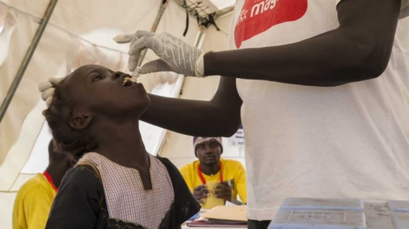 A young girl receiving oral cholera vaccination. Juba, South Sudan.