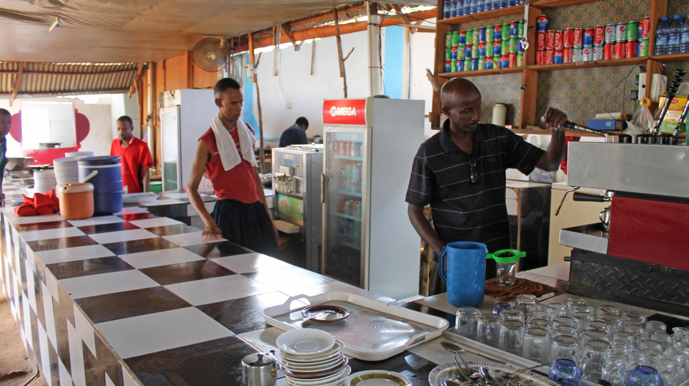 Somalis prepare coffee for customers in a  Mogadishu  restaurant. Photo: AP Photo/Farah Abdi Warsameh