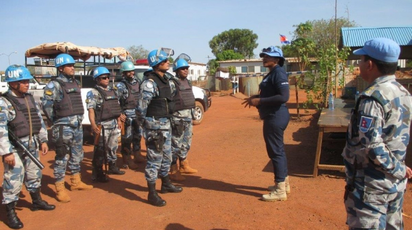 Vera Ayensu, a UN police officer from Ghana, instructs her colleagues in Wau.