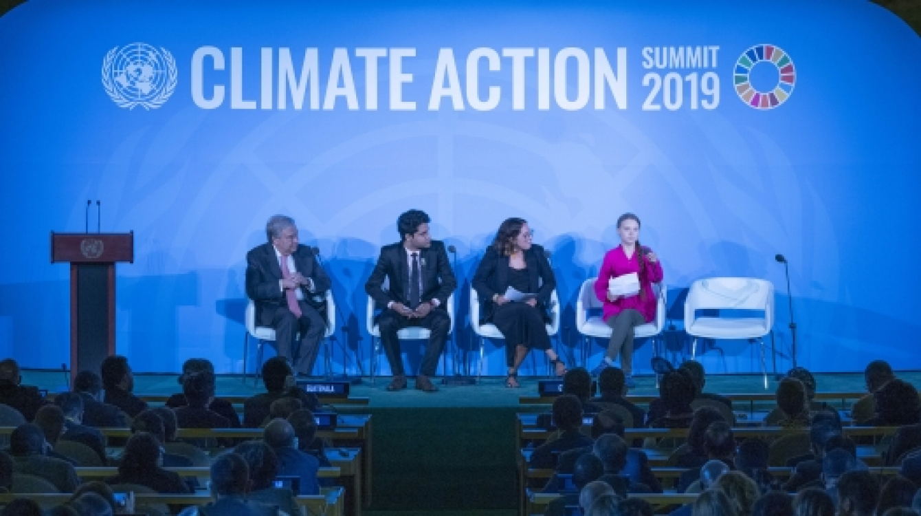 Secretary-General António Guterres (left) with Greta Thunberg (right), Climate Activist.