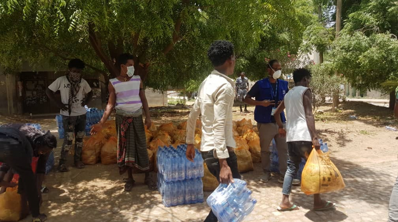 IOM Ethiopia Staff register returnees from Saudi Arabia at the Civil Service College quarantine centre in Addis Ababa.