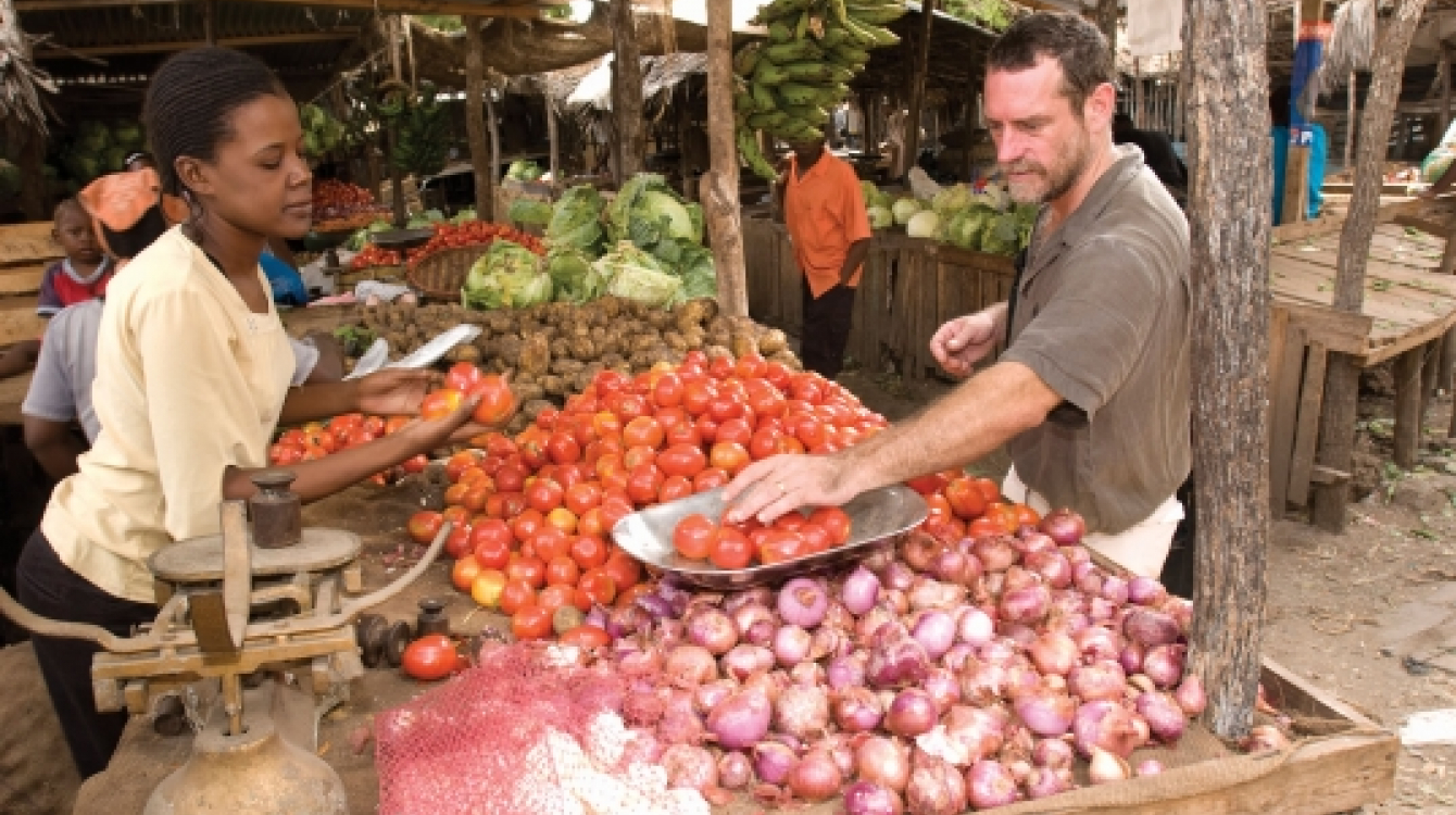 A woman selling agricultural produce in Kenya. Photo: Africa Media Online/Karin Duthie 