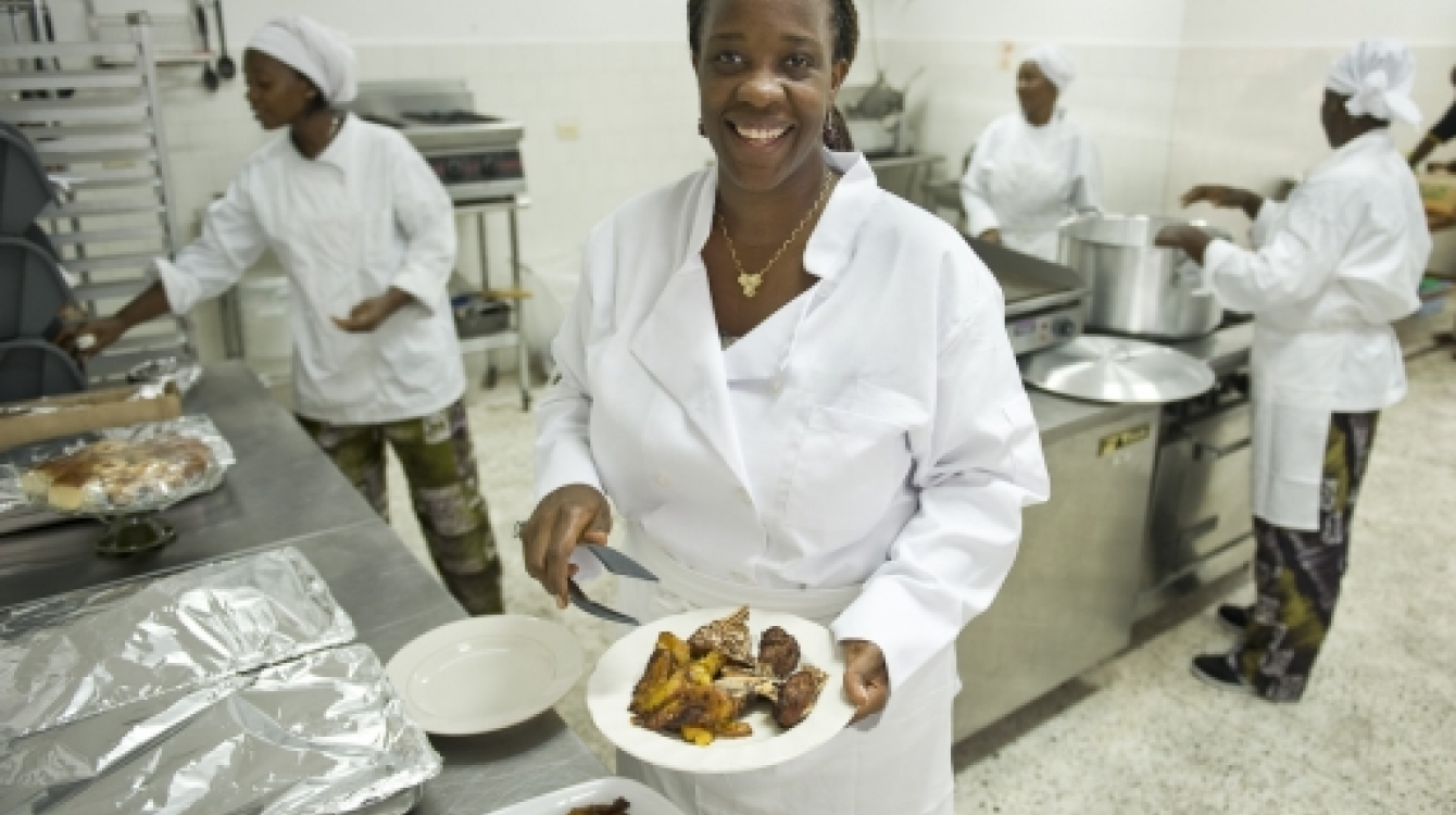 Chef and owner of a restaurant and catering company in Liberia. Photo: UN/ C. Herwig
