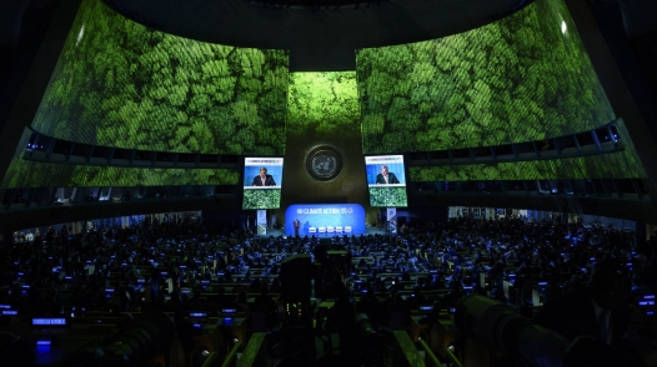Secretary-General António Guterres (on screens and at podium) opens UN Climate Action Summit 2019