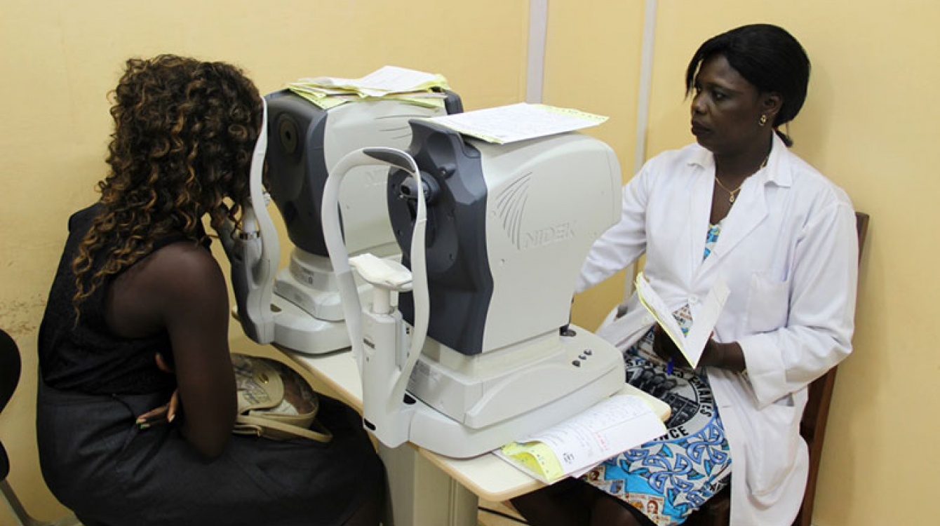 A patient undergoes an eye examination at the Owendo University Hospital in Libreville. Photo:Odilia Hebga/World Bank
