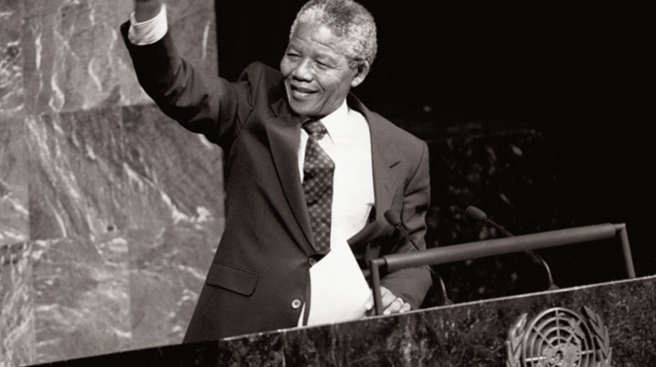 Nelson Mandela, then Deputy President of the African National Congress of South Africa, raises his fist in the air while addressing the Special Committee Against Apartheid in the General Assembly Hall.