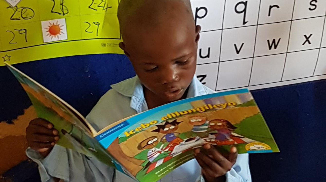 Six-year old Thobela Boyoyo is the most advanced reader in his class.