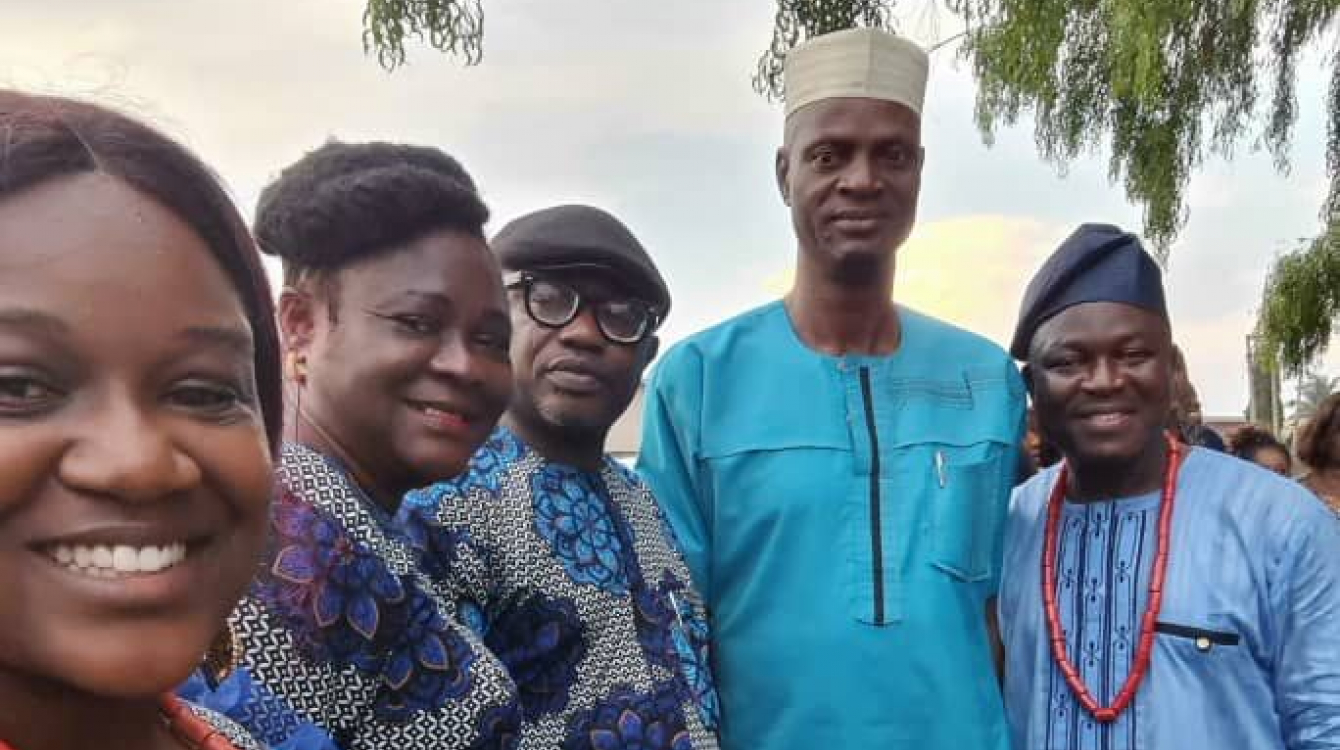 Mr. Ajao at a local ceremony with some Ekpoma residents. Right is Dr. Okhilua.