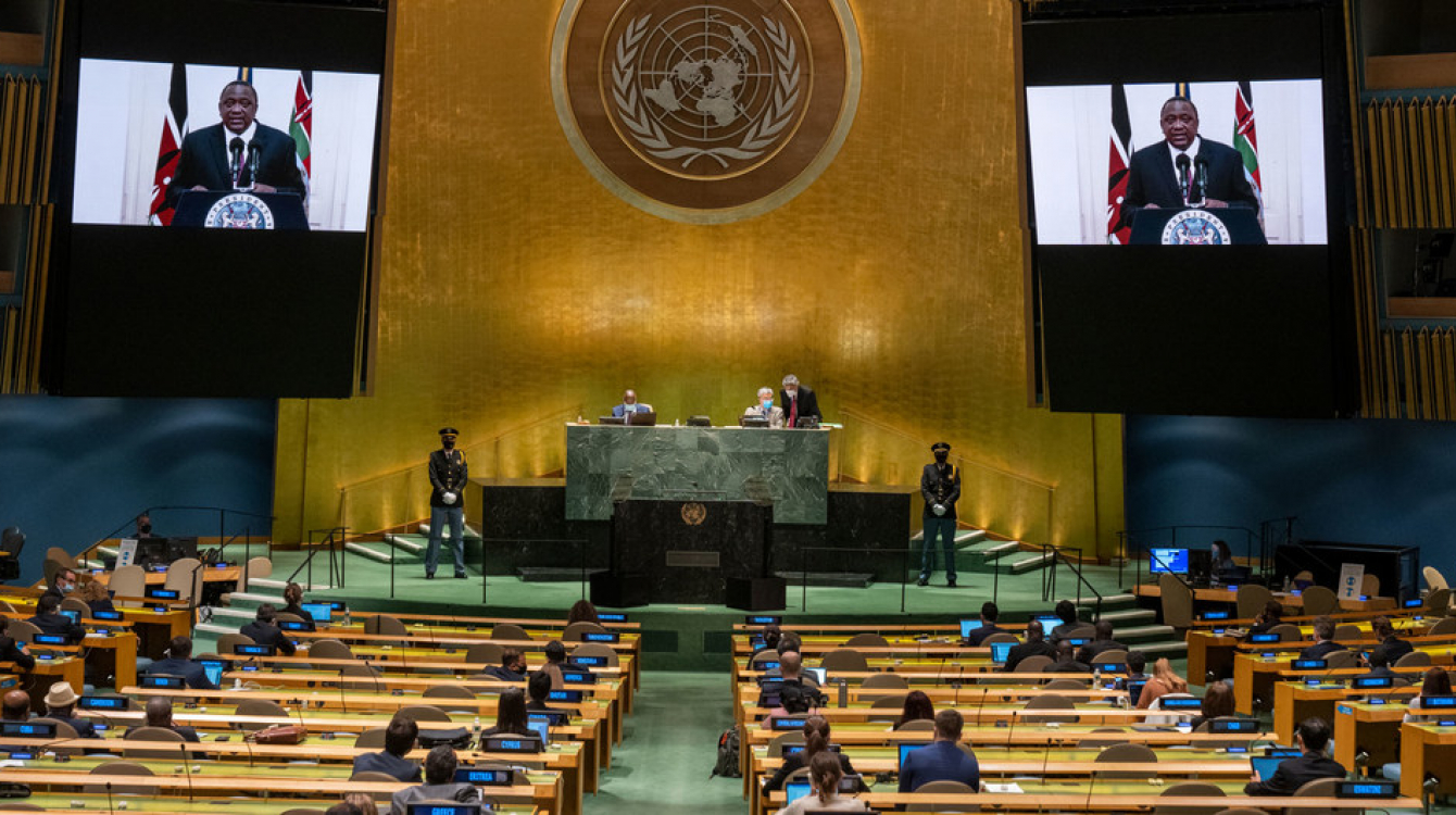 President Uhuru Kenyatta (on screens) of Kenya addresses the general debate of the UN General Assembly’s 76th session.