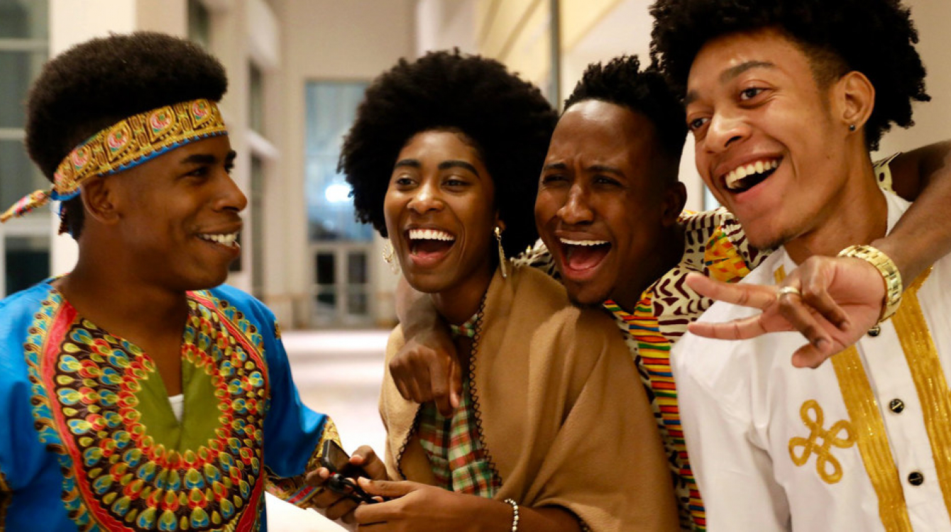 A group of youth laughing.