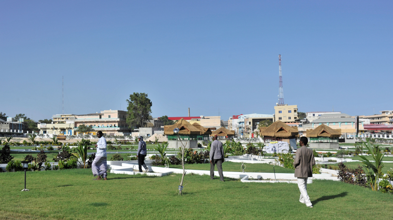 People walk inside the recently opened Peace Garden, in Hamar jajab district of Mogadishu, Somalia. Photo: UN Photo/Ilyas Ahmed