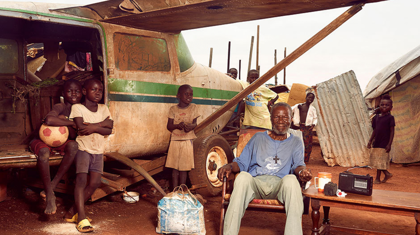 Roger Arnold Tabesse, 73, is one of the 30,000 people living in a camp for internally displaced people at M’Pok Airport. Credit: Stephen Gladieu/World Bank